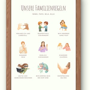 May include: A framed print with a wooden frame featuring watercolor illustrations and German text. The print displays family rules with images of hands forming a heart, children hugging, and a superhero. The text includes "Unsere Familienregeln".