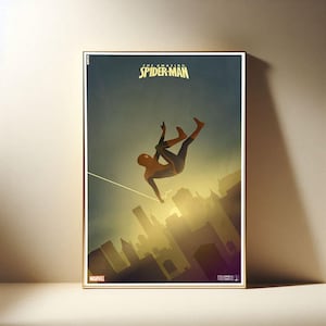 Puede incluir: P&oacute;ster enmarcado del Asombroso Spider-Man en una pose din&aacute;mica, silueteado contra un paisaje urbano. El p&oacute;ster tiene un marco dorado e incluye los logotipos de Marvel y Columbia Pictures.