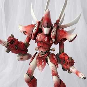 May include: A detailed red and white action figure of a futuristic warrior. The figure has a helmet, armor, and weapons. The figure is posed with its weapons drawn, ready for battle. The figure is approximately 12 inches tall.