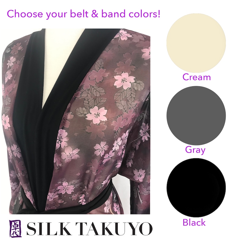 May include: A purple silk robe with a black trim and floral print. Choose from cream, gray, or black for the belt and band colors.  SILK TAKUYO.