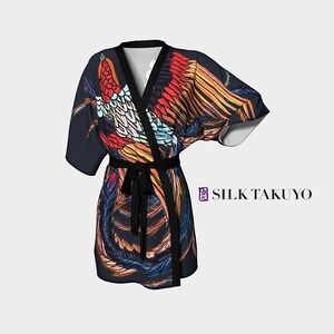 May include: A black silk robe with a colorful phoenix design. The robe has a black sash and short sleeves. The text "SILK TAKUYO" is printed on the bottom right corner of the robe.