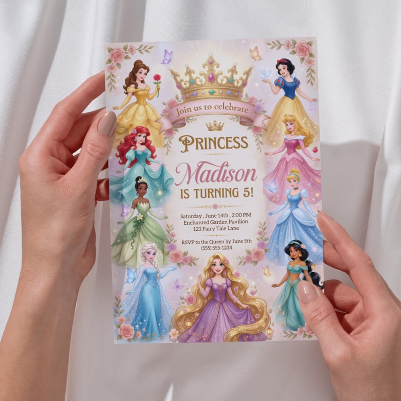 May include: A rectangular birthday invitation card featuring illustrations of eight princesses in colorful gowns surrounding a central gold crown. The text reads: Join us to celebrate PRINCESS Madison IS TURNING 5! Saturday, June 14th, 2:00 PM, Enchanted Garden Pavilion, 123 Fairy Tale Lane, RSVP to the Queen by June 5th (555) 555-1234.