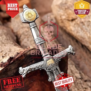 May include: A detailed silver and gold sword with intricate engravings. The hilt features a Star of David emblem. The blade has a decorative crossguard with lion head details. The image includes text that says "Blade Brigade Legendary", "Best Price", "Trusted Seller", "Free Shipping", and "Best Quality".