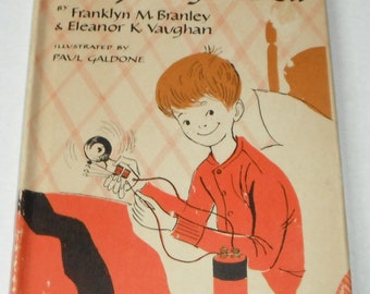 Rusty Rings A Bell by Franklyn M. Branley & Eleanor K. Vaughan Illustrated by Paul Galdone Vintage HCDJ  Weekly Reader Book 1960