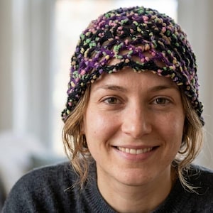 May include: A set of three ceramic nesting bowls in shades of blue, green, and white. The bowls feature a speckled glaze and a simple, modern design. The largest bowl measures approximately 6 inches in diameter.