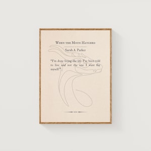 May include: A framed print with the text "When the Moon Hatched" by Sarah A. Parker. The quote "I'm done living the life I've been told to live and not the one I want for myself" is displayed with a line drawing of a dragon.