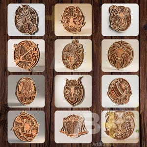 May include: A collection of twelve wooden zodiac signs, each intricately laser-cut with detailed designs. The signs are displayed on individual white squares against a wooden background. The signs include Aries, Taurus, Gemini, Cancer, Leo, Virgo, Libra, Scorpio, Sagittarius, Capricorn, Aquarius, and Pisces.