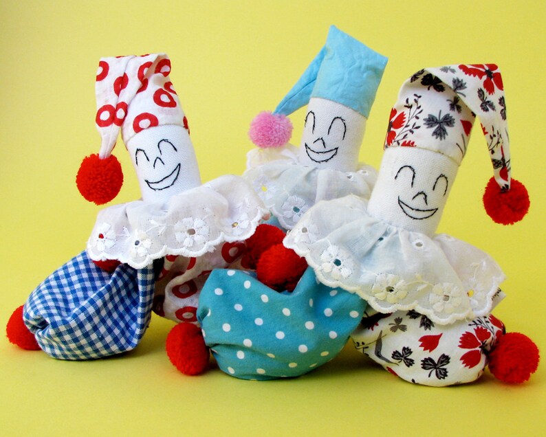 A fun playful bean bag clown doll made from vintage cottons. Etsy