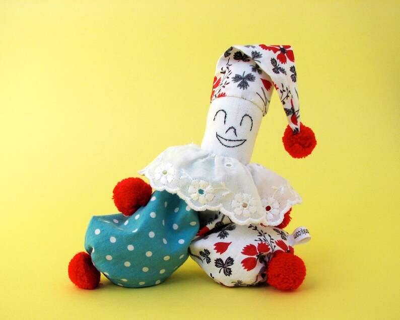 A fun playful bean bag clown doll made from vintage cottons. Etsy