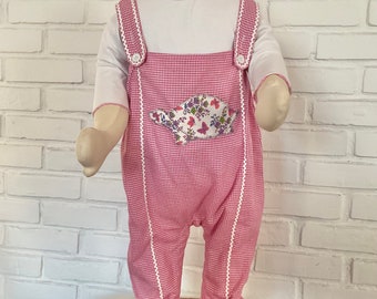 A sweet toddler romper, baby’s pink cotton jumpsuit is appliquéd with a floral TURTLE!