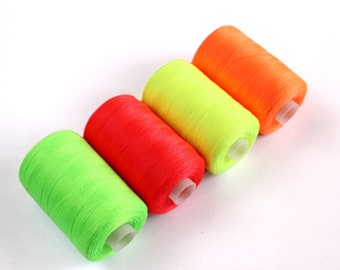Neon fluorescent threads, sewing threads,bright sewing threads, flo threads, dressmaking supplies, sewing machine thread haberdashery, UK
