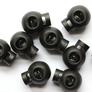 Cierre de cordón con resorte negro: tope de cordón (paquete de 10)