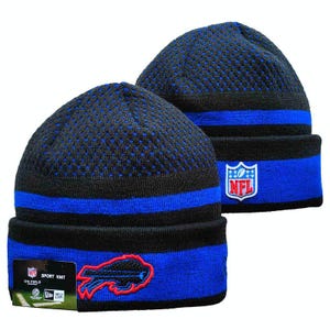 May include: A black and blue knit beanie featuring a textured crown and a cuffed brim. The front displays an embroidered Buffalo Bills logo in red and blue, while the cuff includes an NFL shield patch and a New Era tag with Sport Knit text.