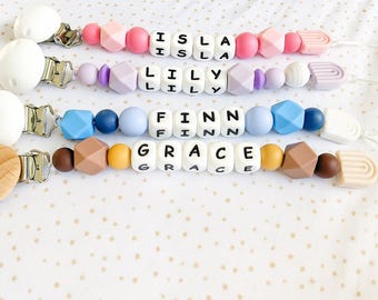 Sujetachupetes de silicona personalizado para bebé, sujetachupetes arcoíris