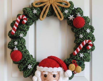 May include: A handmade Christmas wreath featuring a green crocheted base adorned with red ornaments, candy canes, and snowflake accents. A crocheted Santa Claus face is centered at the bottom. A gold bow hangs at the top.