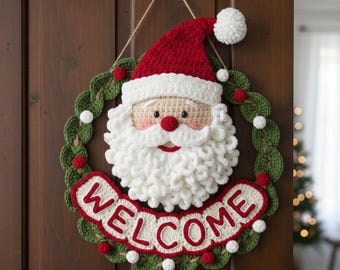 May include: A handmade Christmas wreath featuring a crocheted Santa Claus face with a red hat and white beard. The wreath includes a green leaf design with red and white accents, and the word "WELCOME" in red and white.