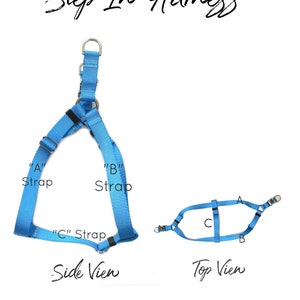 May include: A blue step-in dog harness with three straps labeled "A", "B", and "C". The harness is shown from the side and top views.