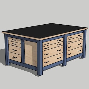 Puede incluir: Un banco de trabajo rectangular grande con una parte superior negra y un marco azul. Cuenta con múltiples cajones con tiradores negros y frentes de cajones de madera natural. El banco de trabajo está diseñado para un taller o espacio de manualidades.