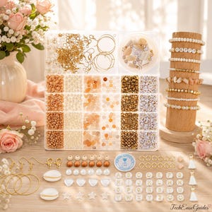 May include: A jewelry making kit featuring a clear plastic organizer box filled with assorted gold-tone findings, white and peach beads, letter beads, and seashells. A wooden display stand holds several finished beaded bracelets.