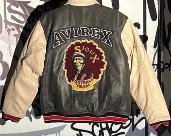 Chaqueta de cuero estilo universitario vintage de Avirex con parche bordado en la espalda y abrigo retro de dos tonos.