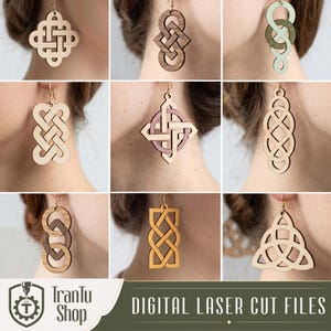 May include: A collection of nine distinct laser-cut wooden earrings featuring intricate geometric and Celtic-inspired knotwork patterns in various light, medium, and dark wood tones, with one pair showcasing a light green and olive green color scheme.