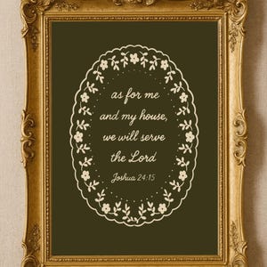 May include: A framed print with a gold ornate frame. The print has a dark green background with a white floral oval design. The text reads "as for me and my house, we will serve the Lord Joshua 24:15."