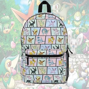 May include: A colorful backpack featuring a repeating pattern of various cartoon characters in a grid design. The backpack has a black handle and straps, a front pocket, and a mesh side pocket. The background is a blurred image of a park.