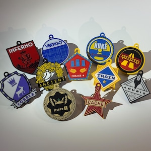 Llaveros con el logotipo del mapa CS2