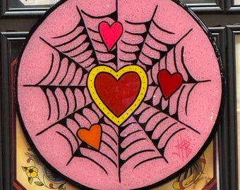Hand painted trapped hearts spider web wood cut sign