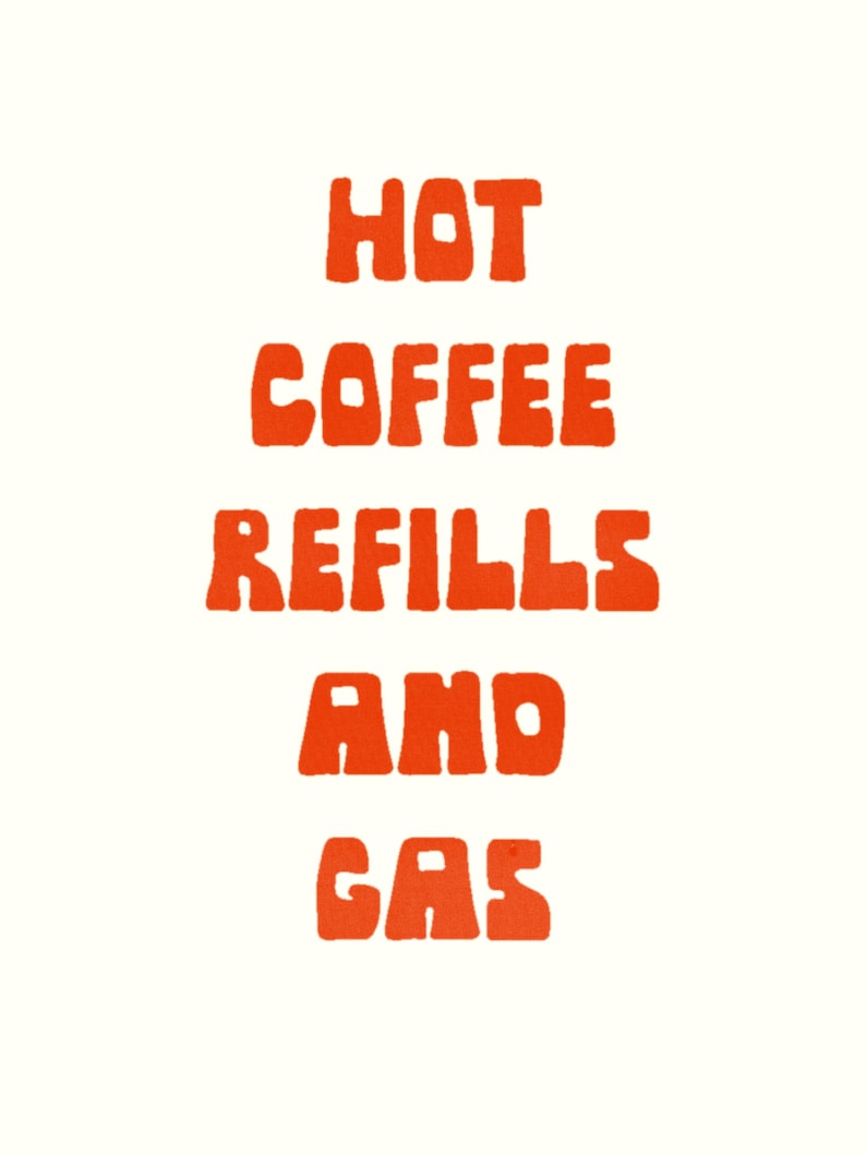 May include: A cream-colored poster with the words "HOT COFFEE REFILLS AND GAS" in bold, orange, retro-style lettering. The text is stacked vertically, centered on the poster.