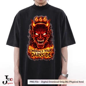 May include: Black t-shirt featuring a red devil graphic with the number 666 above its head and the text "EMBRACE YOUR DARKSIDE". The devil has horns and is surrounded by flames. The shirt is a digital download.