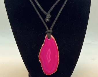 Pink Fuchsia dye agate slab in a black cord necklace
