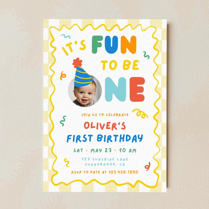 Fun to Be One primary colors first birthday invitation with baby photo, playful typography and colorful party theme.