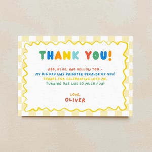 May include: A rectangular thank you card featuring a yellow and white checkered border with a wavy yellow frame. The text reads: THANK YOU! RED, BLUE, AND YELLOW TOO - MY BIG DAY WAS BRIGHTER BECAUSE OF YOU! THANKS FOR CELEBRATING WITH ME, TURNING ONE WAS SO MUCH FUN! LOVE, OLIVER.