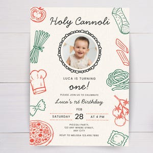 May include: A cream-colored invitation with the text "Holy Cannoli" and "Luca's 1st Birthday." It features a photo of a baby and illustrations of pasta and pizza. The date is February 28th at 4 PM.