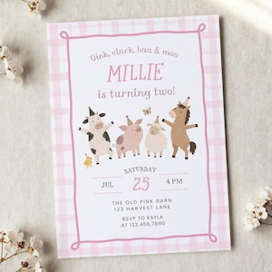 May include: A rectangular birthday invitation card with a pink and white gingham border. The text reads Oink, cluck, baa & moo, MILLIE is turning two!, SATURDAY, JUL 25, 4 PM, THE OLD PINK BARN, 123 HARVEST LANE, RSVP TO KAYLA AT 123.456.7890.