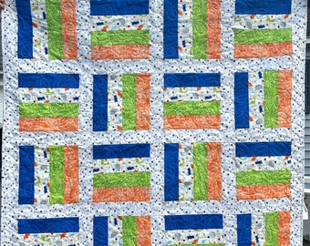 Mini Dinosaurs Baby Quilt in Blue, Green and Orange