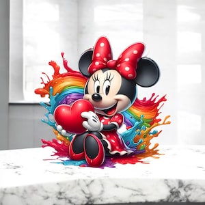 May include: A cartoon character with black ears, a red polka-dot bow, and a red polka-dot dress, holding a red heart. The character is set against a vibrant rainbow splash of colors, with blue and orange accents.