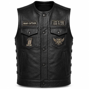 May include: A black leather vest featuring a round neckline, snap button closure, and side lacing. Patches include text reading ROAD CAPTAIN, LIVE TO RIDE RIDE TO LIVE, a number one with stars, and a winged emblem with the text RIDE HARD MC.