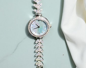Luxe kristallen armbandhorloge: sprankelende elegantie in roze en blauw
