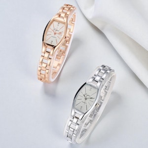 Elegancki damski zegarek na bransoletce: elegancki metalowy design w kolorze srebrnym i różowego złota
