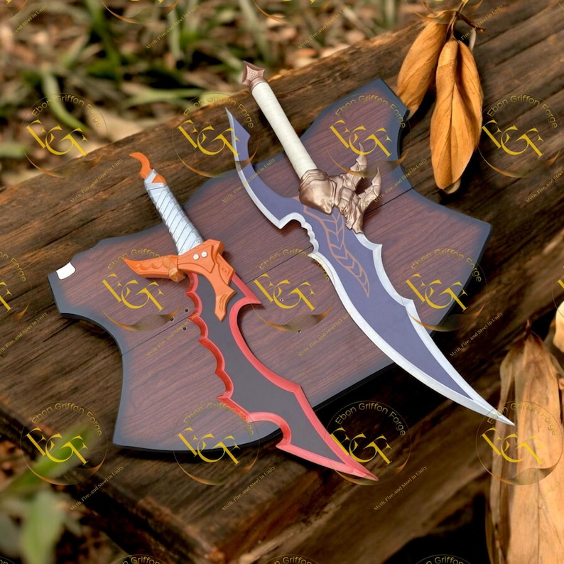 May include: Two decorative swords with ornate designs. One sword features a red and black blade with an orange hilt, while the other has a blue blade and gold accents. Both are displayed on wooden plaques.