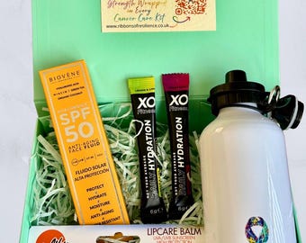 Summer Cancer Care Kit | SPF 50 Face Fluid, Lip Balm, Hydration Sachets, Water Bottle