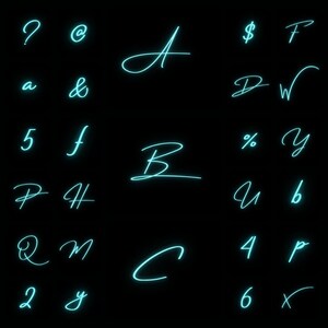 May include: A selection of teal cursive characters and symbols on a black backdrop. The image features letters like A, B, C, and numbers including 2, 4, 5, and 6, alongside symbols such as the dollar sign, percent sign, and question mark.