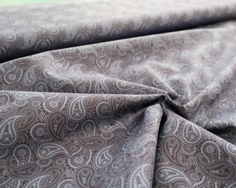 Tela de algodón con estampado paisley gris y blanco: elegante tejido estampado, ligero, ideal para vestidos y blusas.