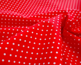 Tela de algodón con lunares rojos y blancos: un tejido clásico para vestidos y blusas, se vende por metro.