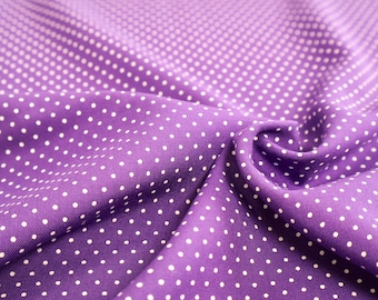 Tejido de viscosa morado con pequeños lunares: tejido ligero de verano con una caída suave.