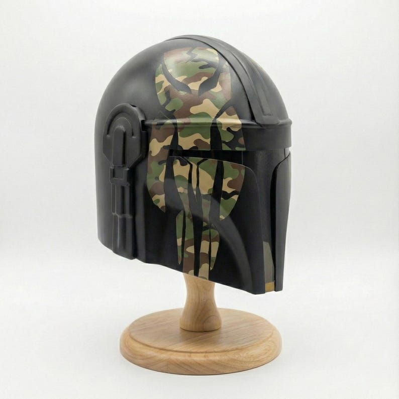 Hand-painted steel Mandalorian helmet in black with a bold red Mythosaur logo; cosplay armor style for fans.
