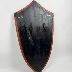 Leather-covered plywood templar shield with cross motif; crusader shield style, riveted edge for wall decor and medieval cosplay.