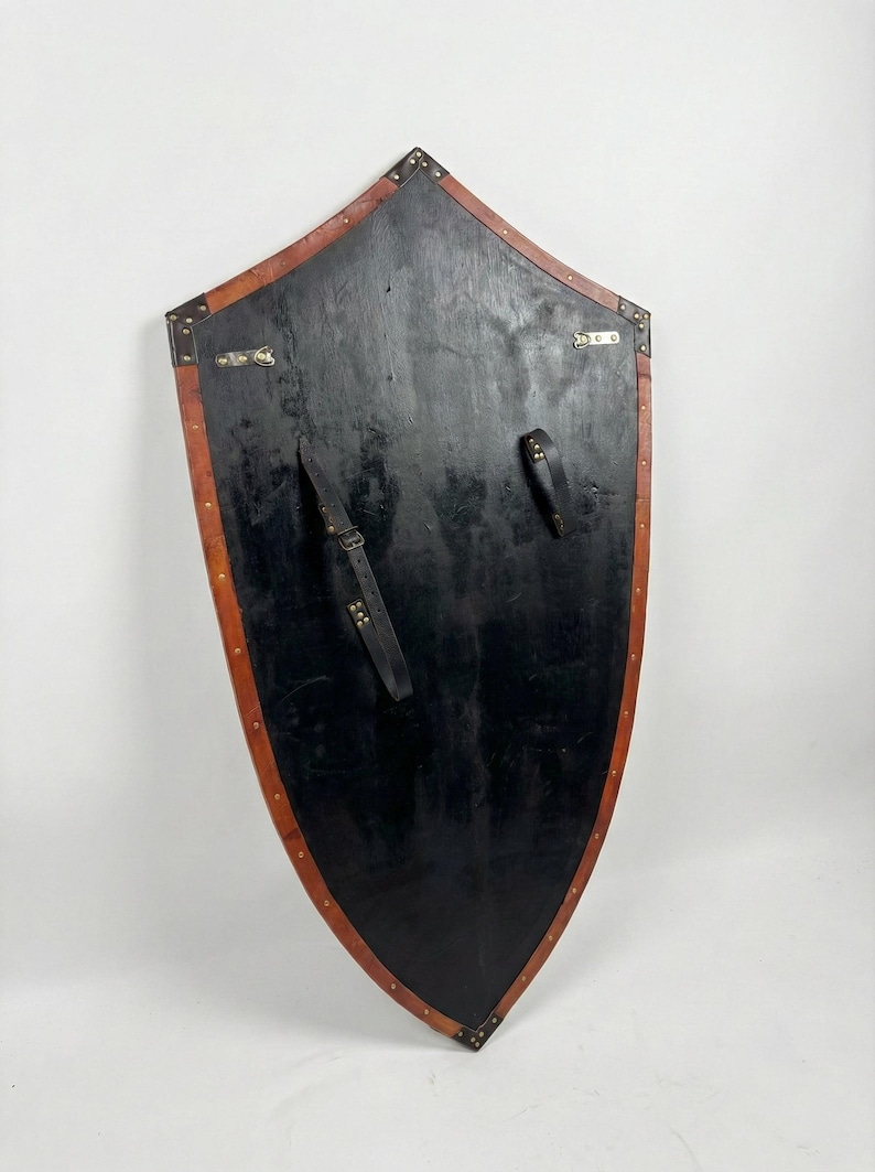 Leather-covered plywood templar shield with cross motif; crusader shield style, riveted edge for wall decor and medieval cosplay.